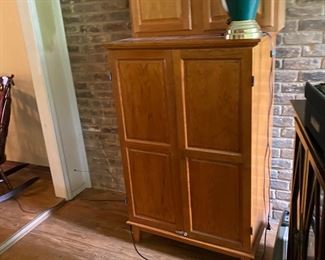 Looks like a  “farmhouse look “ self standing pantry…. But, it’s an all in one office!!!!  Expands, electrical outlets, write on wipe-off board, files, hidden compartments, and more!!!!