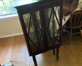 Gorgeous antique treasure keeper! With mirror back panel and glass shelves