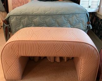 One of 2 cool arched ottomans