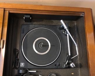Record player inside cabinet