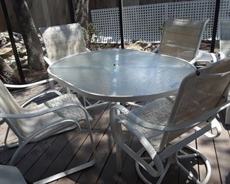 Glass and white heavy and great quality outdoor table and chairs with two matching lounges