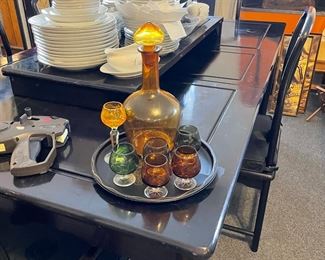 Black lacquer Asian inspired dining table with six chairs $95