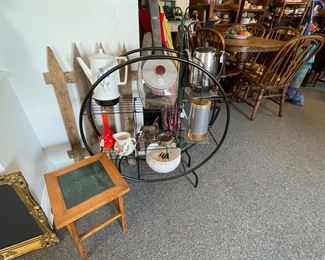 Vintage coffee pots on round shelf