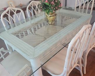 Nice glass top dining room table with six chairs