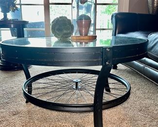 Glass top table with bike bicycle spokes design