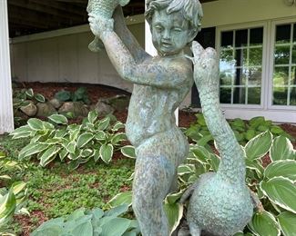 Bronze boy with fish garden fountain 