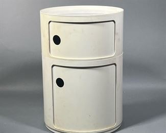 KARTELL SIDE ROUND TABLE | Mid-century modern side tables / storage units: Componibili Classic by Anna Castelli Ferrieri for Kartell Binasco Milan, in cream, with two sliding doors revealing interior shelves; c. 1960s. - h. 24 x dia. 16.5 in