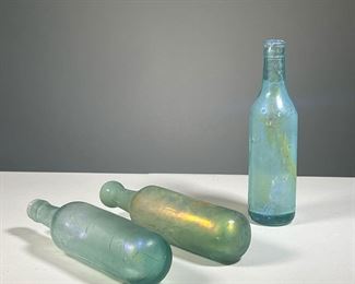 (3PC) IRIDESCENT GLASS BOTTLES | Art glass iridescent bottles, two with rounded bottoms. - h. 9.25 in