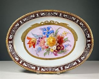 MEISSEN HAND PAINTED PLATTER | Decorated with blooming flowers in reserve, with border in relief and gilt braided rim; blue underglaze crossed swords mark to underside. - l. 17 in