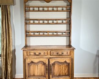 RICHELIEU SOLID OAK HUTCH | Richelieu Art et Muebles de France, impressed stamp mark on back, three plate racks over a lower section with two drawers and two cabinet doors.  l. 51 x w. 18.5 x h. 86.5 in
