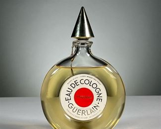 GUERLAIN SHALIMAR EAU DE COLOGNE | Round Guerlain bottle with a pointed cap. h. 7.5 in