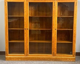 ANTIQUE OAK BOOKCASE CABINET | Golden oak with adjustable shelves and three glazed glass doors. 11-inch interior depth. - l. 60 x w. 13 x h. 53 in
