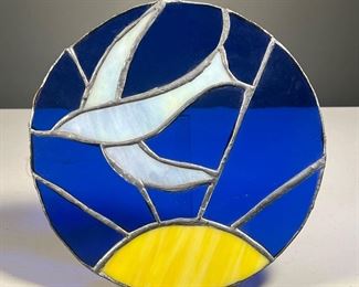 STAINED GLASS DECORATION | Hand wrought stained glass window hanging with a bird and sun. - dia. 10 in