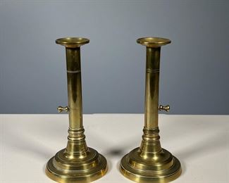 (2PC) PAIR-TURNED BRASS CANDLESTICKS | Pair of modest-sized brass candlesticks with raises. - h. 8 x dia. 3 3/4 in