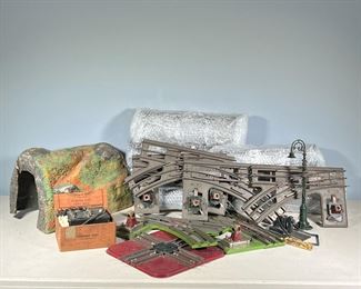 COLLECTION LIONEL / AMERICAN FLYER PARTS | Mostly track but also including a Lionel multi volt, toy transformer Lionel 2 to 3 illuminated switch Lionel 210 standard illuminated switch the lamp post a tunnel (with minor damage) and some other pieces