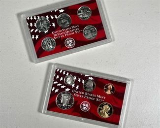 (2PC) US MINT PROOF SETS | Including a 2001 United States Mint Silver Proof Set with a dollar coin, half dollar, dime, nickel, and penny; and a 2001 United States Mint 50 State Quarters Silver Proof Set with five quarters.