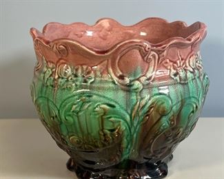 MAJOLICA PLANTER | Sculpted majolica pottery planter with scalloped edge, in pink, green, and purple. 