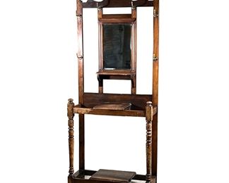 OAK HALL TREE | Having a small shelf in middle and bottom, inset mirror, with 6 hooks around the top and side. - l. 33 x w. 13 x h. 77 in