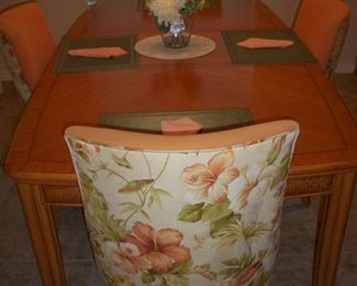 The Table is American Drew Furniture "Antigua Collection" in Toasted Almond it has a leaf and stores inside table. The other 4 Braxton Culler Furniture "Tuxedo" Chairs.
