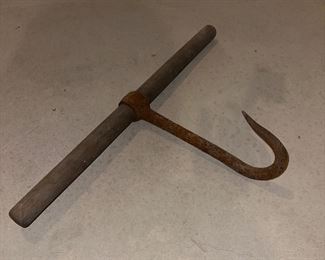Primitive meat hook hay bale