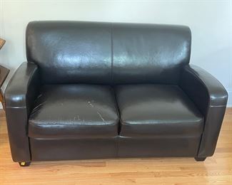 Leather Parker love seat 