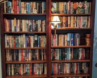 SOME OF THE MANY BOOKS in this HOME