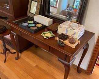 $120 Desk or entry table shown with framed beveled mirror. Small items available for in person purchase. Desk measurements 42"w X 22.5" d X 29"h. 