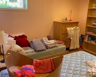 Twin beds, chests and bookcases