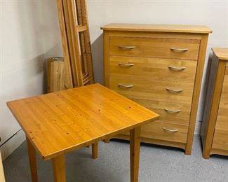 Photo of five-drawer dresser sold as a set in the previous photo. Square table sold in a separate photo.