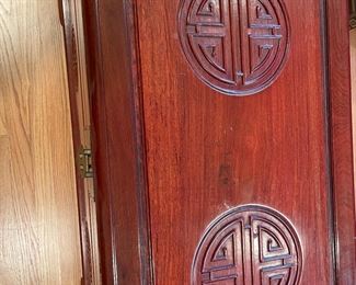 Close up of the finish and carving on chest