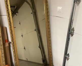 $340 each One of a pair of gilt framed mirrors. 36 x 74.5