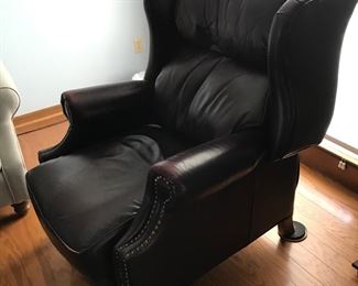 Lazy Boy Leather recliner with nail head trim and talon feet.