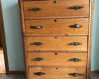 Wonderful oak dresser. Some of the hardware has been replaced.  Love the trim going down the sides