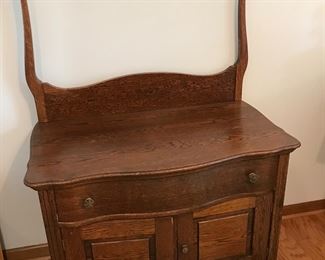 Another beautiful oak piece - washstand with towel bar and commode door.