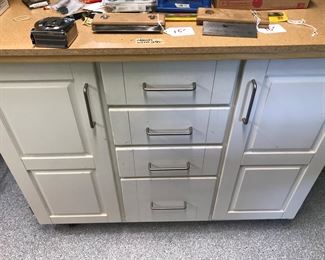 Cabinet with with wheels and top for storge