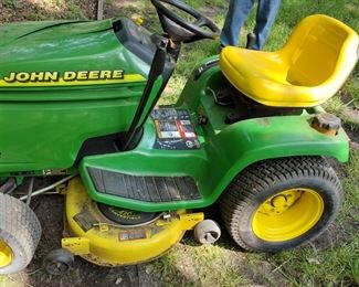 John Deere riding lawn mower