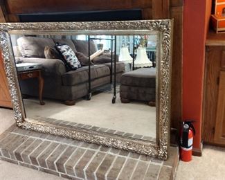large gold framed mirror