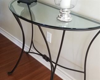 Slender metal and glass entry console