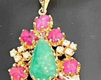 #9  4.6 yellow gold pendant with .50 ct total weight vs clarity I color jade and rubies
#7   $1150. 