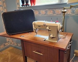sewing machine with table
