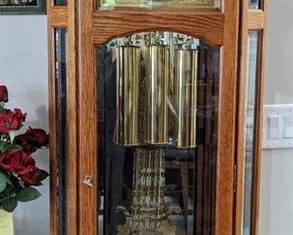 Howard Miller grandfather clock-All furniture and wall art will be on pre-sale online only starting Wednesday June 21 Text 615-854-8535 or email nashville@entrustedestatesales.com for pricing, purchasing, adn with any questions. 