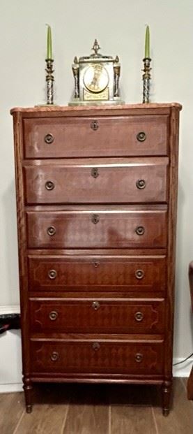 Louis XVI design rosewood parquetry semanier. Marble topped 6 drawer chest. 
All furniture and wall art will be on pre-sale online only starting Wednesday June 21. Text 615-854-8535 or email nashville@entrustedestatesales.com for pricing, purchasing, or with any questions. 