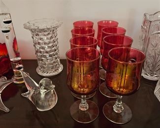 Red stemware, glass bird and more