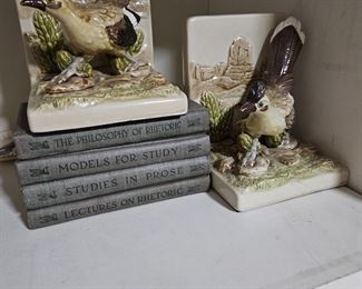 Roadrunner bookends and antique books