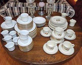 Dinnerware and an antique clawfoot table