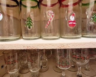 Various Christmas holiday decor glasses