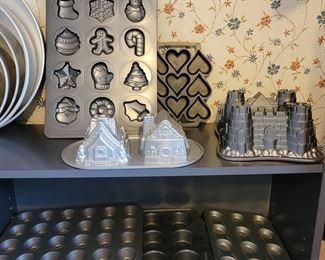 Client was professional baker! 1000's of molded bakeware tins, vintage cake decor, wedding cake towers, silicone pans, cookie cutters, other baking items +++