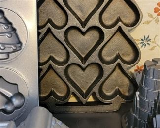 Client was professional baker! 1000's of molded bakeware tins, vintage cake decor, wedding cake towers, silicone pans, cookie cutters, other baking items +++