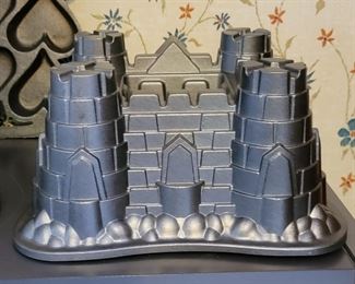 Client was professional baker! 1000's of molded bakeware tins, vintage cake decor, wedding cake towers, silicone pans, cookie cutters, candy molds, other baking items +++