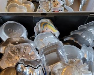 Client was professional baker! 1000's of molded bakeware tins, vintage cake decor, wedding cake towers, silicone pans, cookie cutters, candy molds, other baking items +++